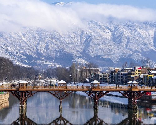 Beautiful scenery of Zero bridge with Himalaya mountain covered with snow in the background.
